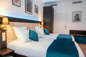 Posteľ alebo postele v izbe v ubytovaní Cottages de France CDG