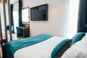 Posteľ alebo postele v izbe v ubytovaní Cottages de France CDG