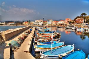a group of boats docked in a harbor at Studio le Monroe les pieds dans l'eau 10 m de la mer in La Seyne-sur-Mer