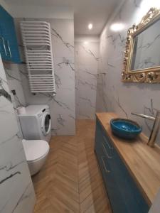 Kúpeľňa v ubytovaní Super Centrum Szymborskiej 2 z parkingiem podziemnym Apartamenty LUNA Bialystok