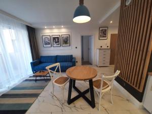 Posedenie v ubytovaní Super Centrum Szymborskiej 2 z parkingiem podziemnym Apartamenty LUNA Bialystok