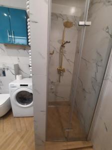 Kúpeľňa v ubytovaní Super Centrum Szymborskiej 2 z parkingiem podziemnym Apartamenty LUNA Bialystok
