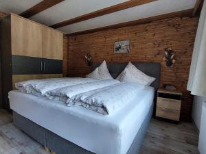 Postel nebo postele na pokoji v ubytování Gästehaus Rita