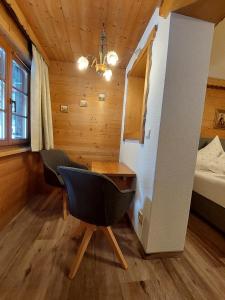 Postel nebo postele na pokoji v ubytování Gästehaus Rita