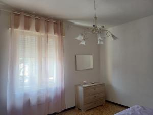 Televízia a/alebo spoločenská miestnosť v ubytovaní Casa Ilanfra - appartamenti Gabbiano, Farfalla e Stella Marina