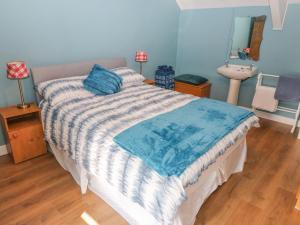 Letto o letti in una camera di Gleann Griannmhar