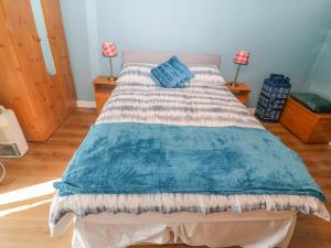 Letto o letti in una camera di Gleann Griannmhar