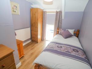 Letto o letti in una camera di Gleann Griannmhar