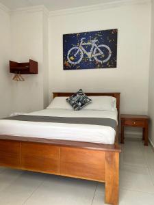 Säng eller sängar i ett rum på El Hotel de los Ciclistas