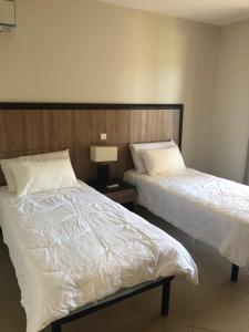 Posteľ alebo postele v izbe v ubytovaní Résidence Luxe à Porto Vecchio + 12 fotografií