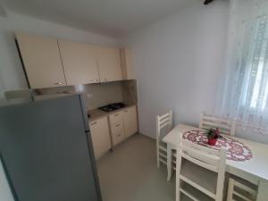 Kuchyň nebo kuchyňský kout v ubytování Guest House Vlore