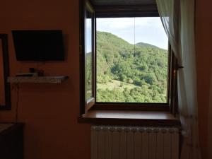 Nespecifikovaný výhled na hory nebo výhled na hory při pohledu z bed and breakfast