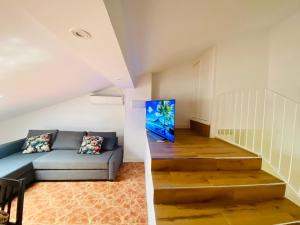 Χώρος καθιστικού στο APARTAMENTO TURISTICO ATICO LA TABERNA