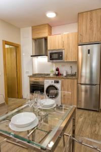 Kuchnia lub aneks kuchenny w obiekcie APARTAMENTOS ONNIGHT