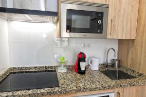 Kuchnia lub aneks kuchenny w obiekcie APARTAMENTOS ONNIGHT