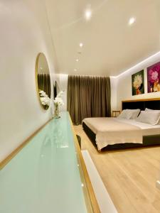 Bazén v ubytování Hotel Nertili nebo v jeho okolí