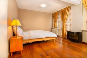Giường trong phòng chung tại Hotel Swiss Views