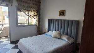 Postel nebo postele na pokoji v ubytování L'horizon bleu