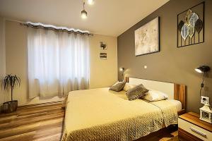 Postel nebo postele na pokoji v ubytování Apartment Korado
