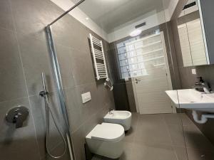 Koupelna v ubytování Kibilù - Cascina Merlata Rho Fiera Ospedale Galeazzi + 12 fotografií