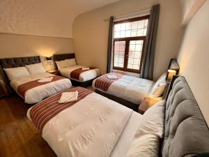 Postel nebo postele na pokoji v ubytování Casona Plaza Hotel Cusco
