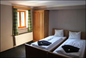 Postel nebo postele na pokoji v ubytování Hotel Alba