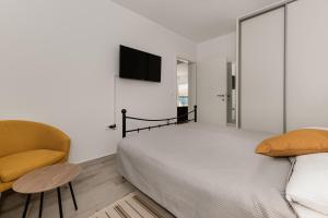 Posteľ alebo postele v izbe v ubytovaní Villa Emanuel + 37 fotografií