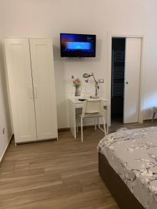Postel nebo postele na pokoji v ubytování B&B Piano Romano -con parcheggio privato gratuito-
