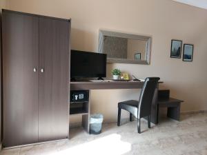 Kuchyň nebo kuchyňský kout v ubytování Hotel Epavli