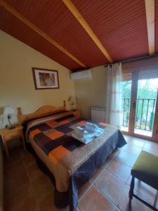 Postel nebo postele na pokoji v ubytování Casas Rurales El Cobijo de Sierra Cazorla
