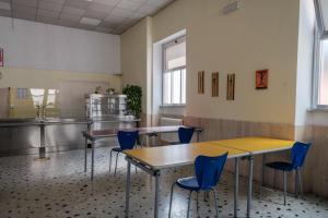Reštaurácia alebo iné gastronomické zariadenie v ubytovaní Foresteria Roma Esercito della Salvezza