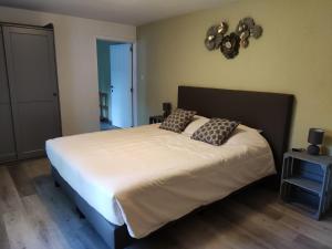 Postel nebo postele na pokoji v ubytování B&B Emmylou