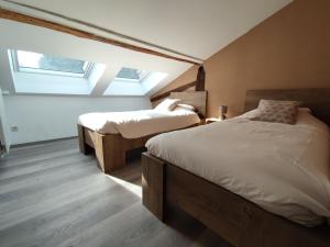 Postel nebo postele na pokoji v ubytování B&B Emmylou