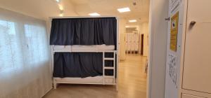 Postel nebo postele na pokoji v ubytování Albergue SIXTOs no Caminho
