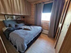 Cama o camas de una habitación en Hygge på fjellet