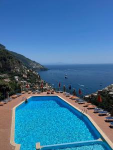 The swimming pool at or near Flower Power Apartment (Positano)