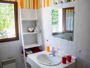 a bathroom with a sink and a mirror at Gîte Le Mayet-de-Montagne, 4 pièces, 6 personnes - FR-1-489-317 in Le Mayet-de-Montagne