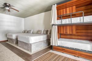Cama o camas de una habitación en Selina Tulum