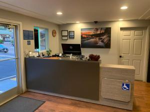 an office with a counter with a computer on it at Black Jack Inn in South Lake Tahoe