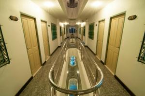 a hospital hallway with a water slide at Boonthavon in Chiang Mai
