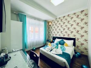 Postel nebo postele na pokoji v ubytování Dalat Eco Hotel