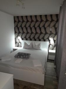 A bed or beds in a room at CasaRiana 3