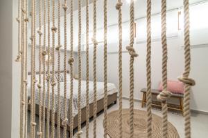 A bed or beds in a room at Trinity Seaside Family Maisonette