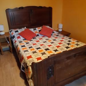 Postel nebo postele na pokoji v ubytování ferme de Bournazel