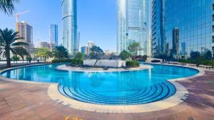 Fotografie z fotogalerie ubytování Cozy 1BR in Iconic Tower v destinaci Abu Dhabi