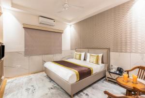 Postel nebo postele na pokoji v ubytování Hotel Star By Star Group- Near Delhi Airport