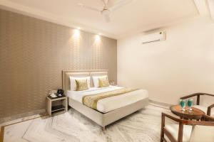 Postel nebo postele na pokoji v ubytování Hotel Star By Star Group- Near Delhi Airport