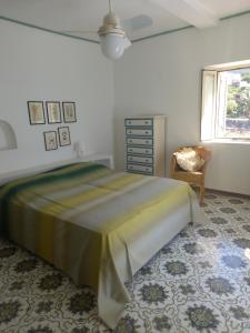 A bed or beds in a room at Villa Donatella