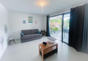 Posezení v ubytování KAZ'ANTILLAISE TI LUCA APPARTEMENT 3/4 PERS.