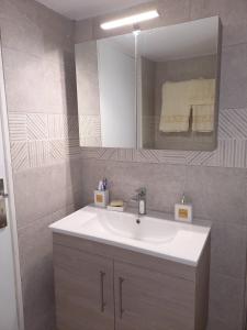 Et badeværelse på Andreas Apartment